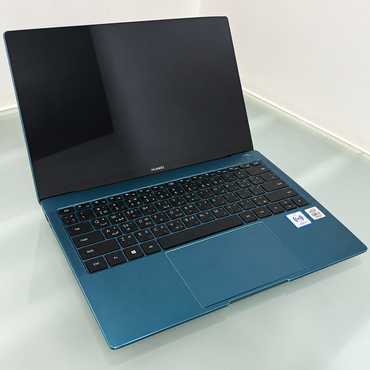 Used HUAWEI MateBook X Pro 2021 Emerald Green laptop open with 13.9-inch display and Arabic English keyboard