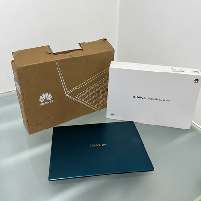 Used HUAWEI MateBook X Pro 2021 Emerald Green laptop open with 13.9-inch display and Arabic English keyboard